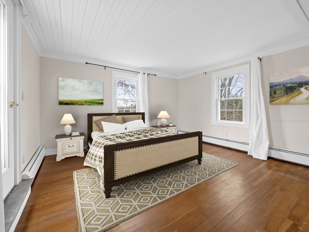 775 Shore Road Bourne, MA 02559 - Photo 35 of 42 a living room with furniture rug and window