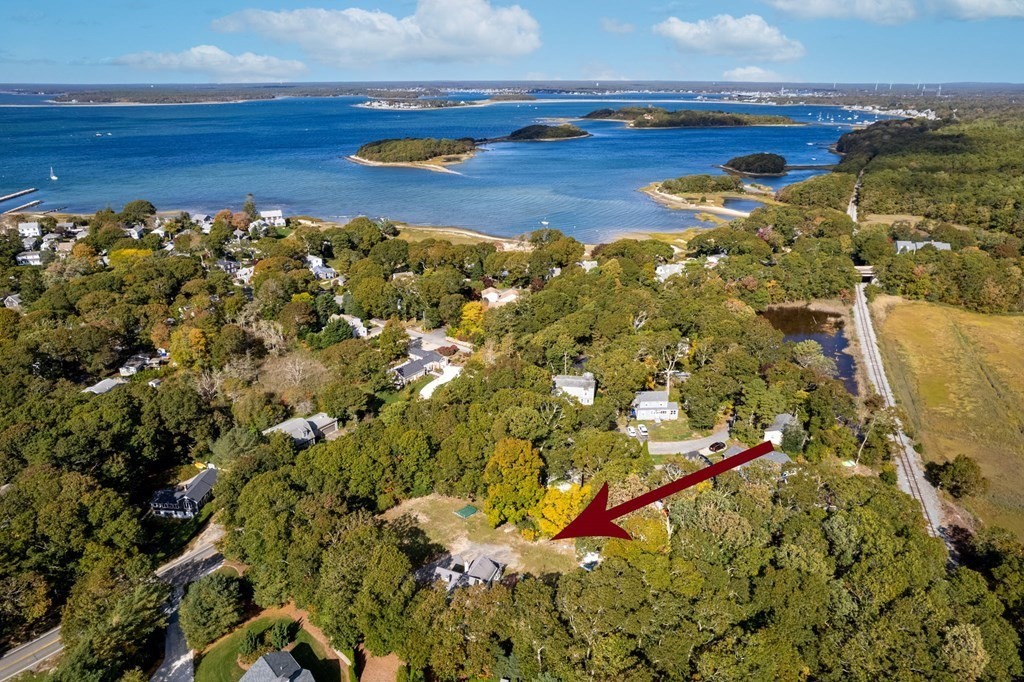 775 Shore Road Bourne, MA 02559 - Photo 41 of 42 a view of a yard with an outdoor space