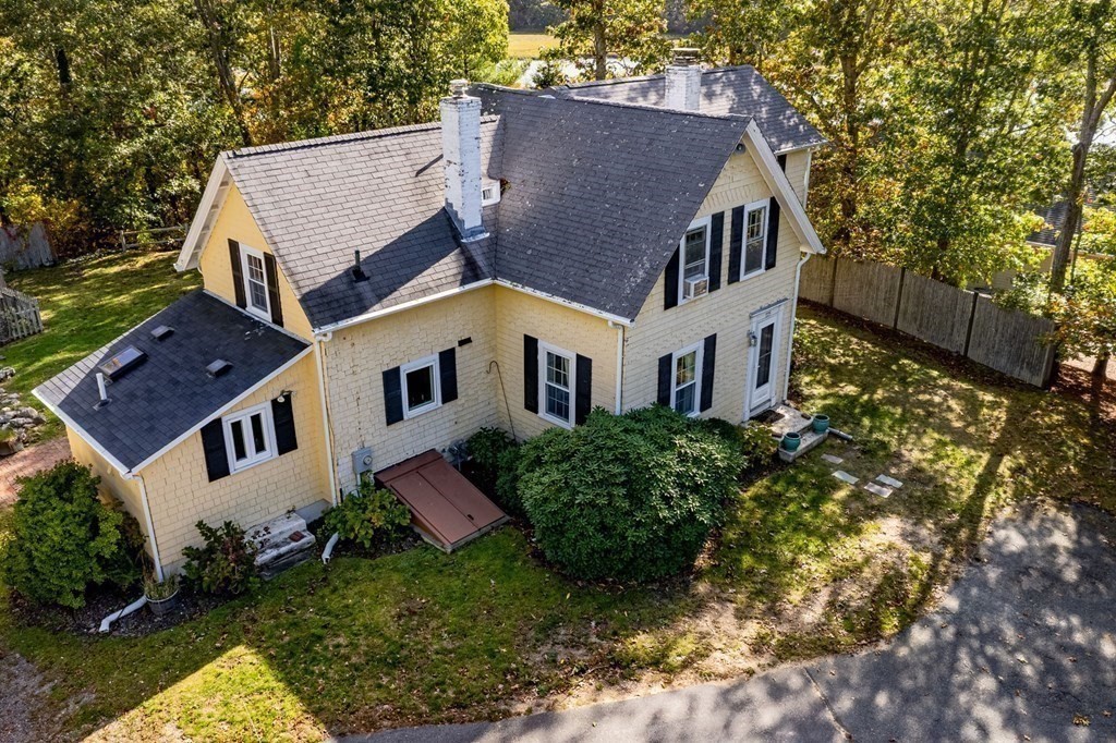 775 Shore Road Bourne, MA 02559 - Photo 6 of 42 front view of a house with a yard