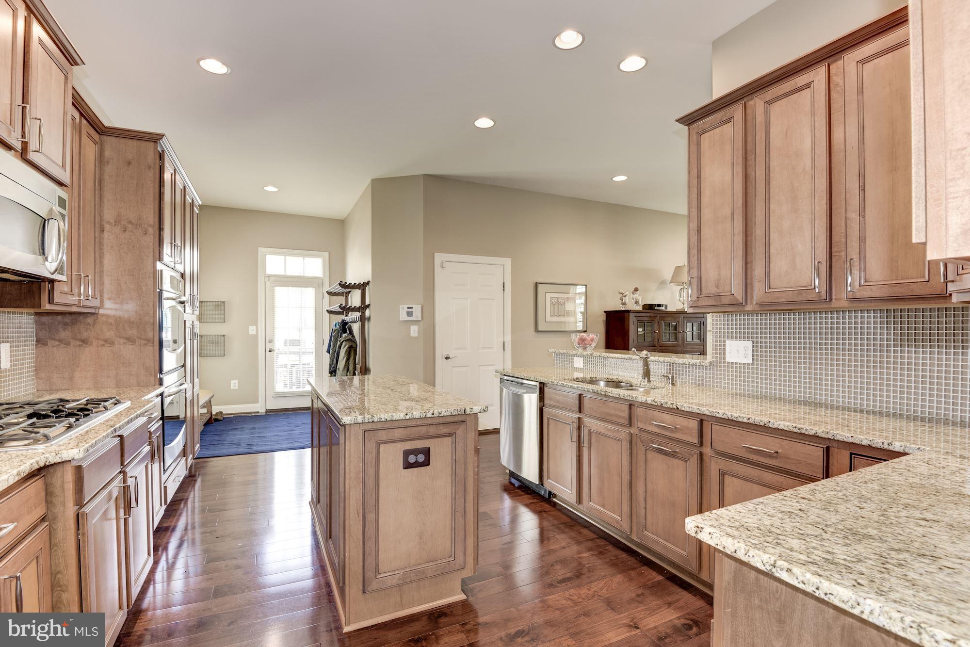 6015 Masondale Road Alexandria, VA 22315 - Photo 11 of 30 Glass Backsplash, Wide Plank Floor on Main Level