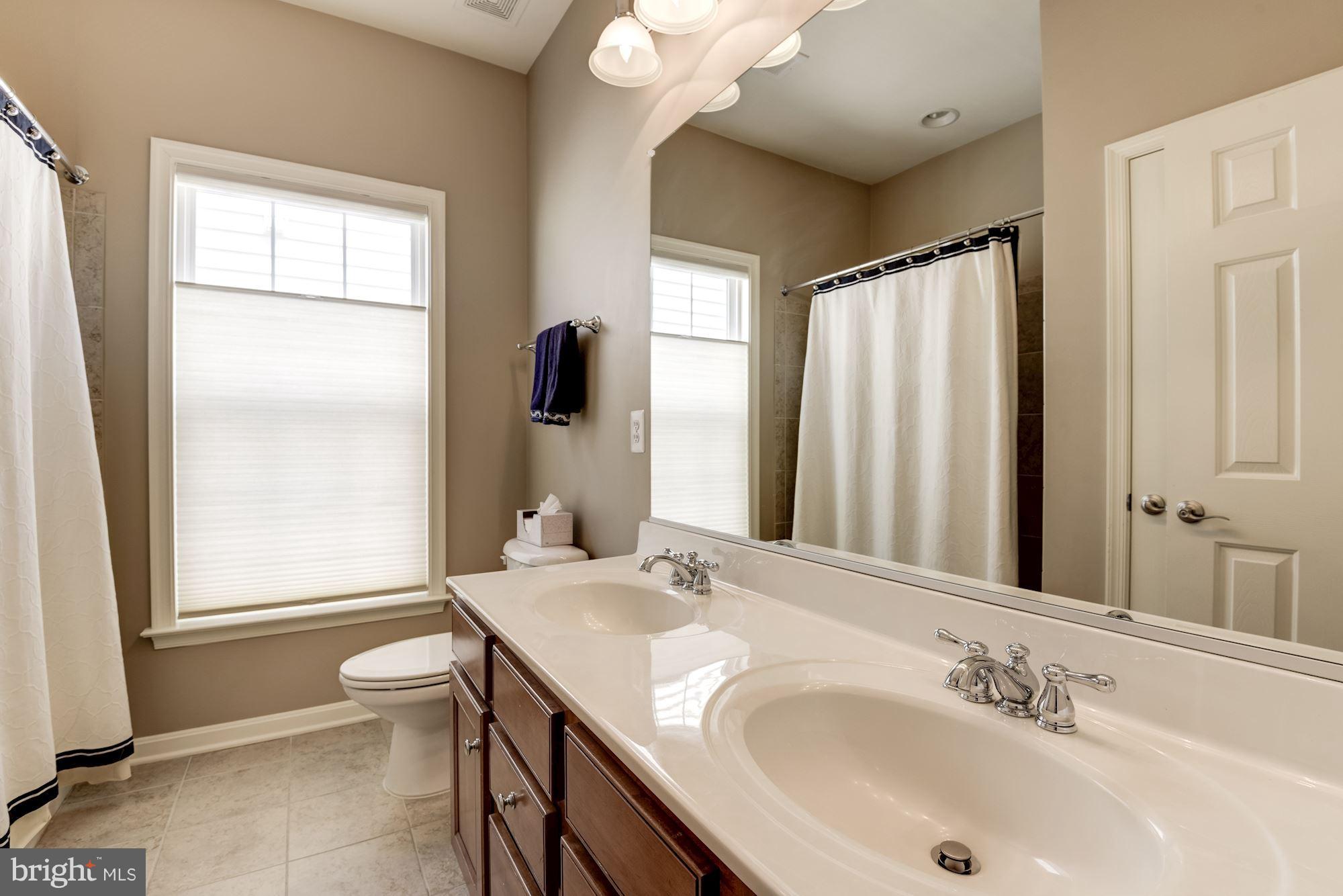 6015 Masondale Road Alexandria, VA 22315 - Photo 15 of 30 Dual Sink Vanity, Large Ceramic Tile in Hall Bath