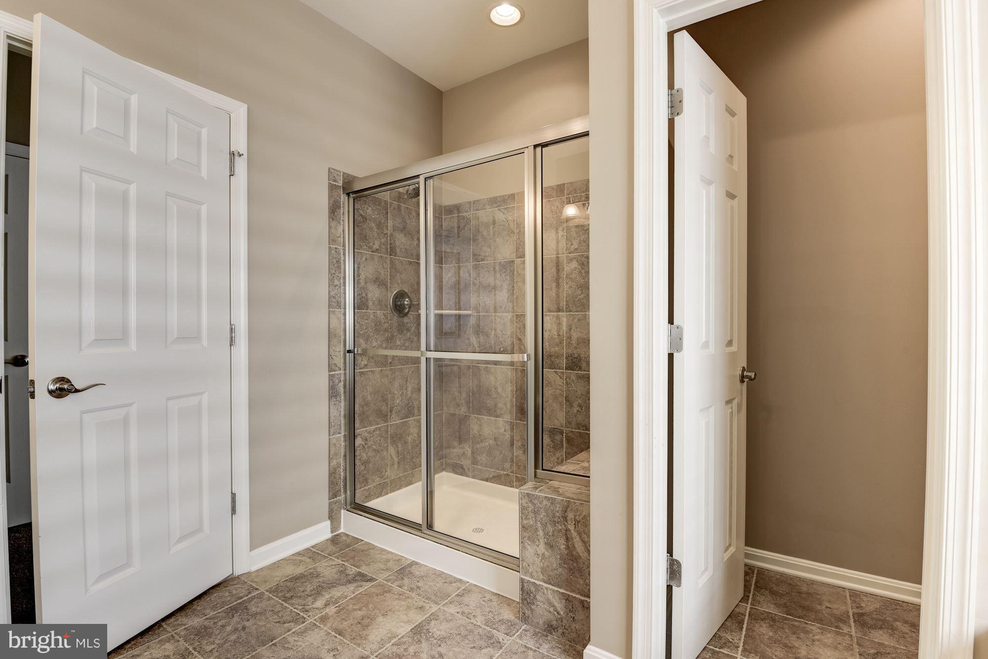 6015 Masondale Road Alexandria, VA 22315 - Photo 19 of 30 Separate Shower and Water Closet. Ceramic Tile