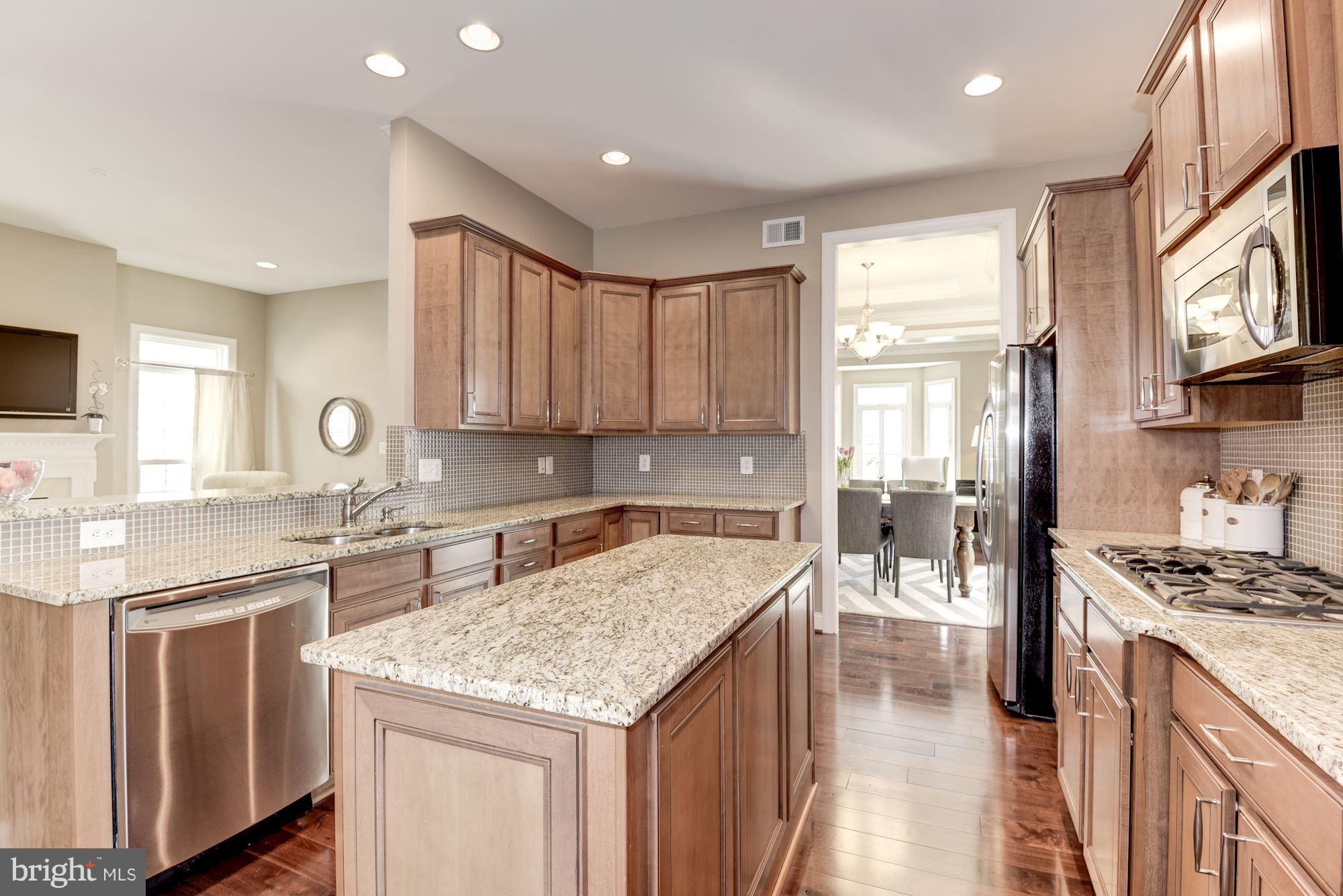 6015 Masondale Road Alexandria, VA 22315 - Photo 10 of 30 Granite Counters, Center Island, Gas Cooking