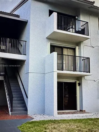 a view of a house with roof deck
