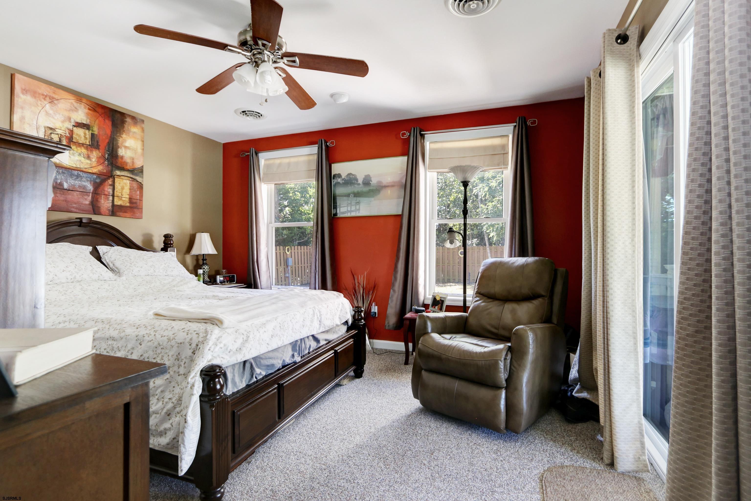 34 North Shore Road Marmora, NJ 08223 - Photo 20 of 37 a bed room with a bed and a couch