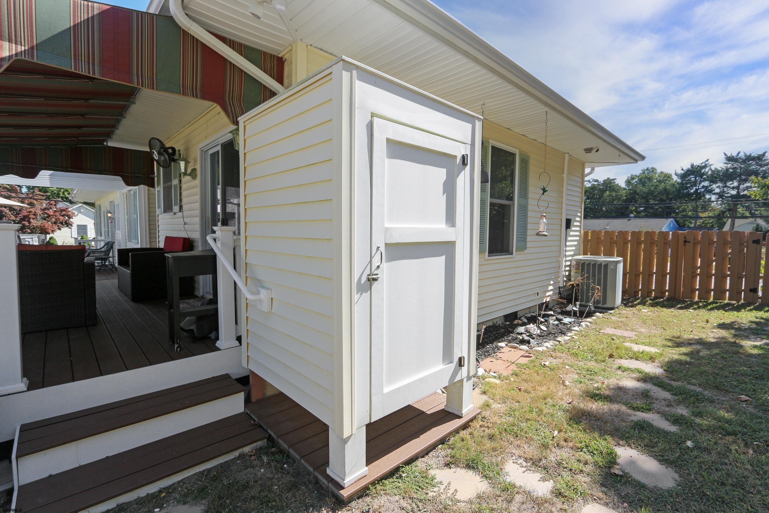 34 North Shore Road Marmora, NJ 08223 - Photo 26 of 37 a view of a house with backyard and sitting area