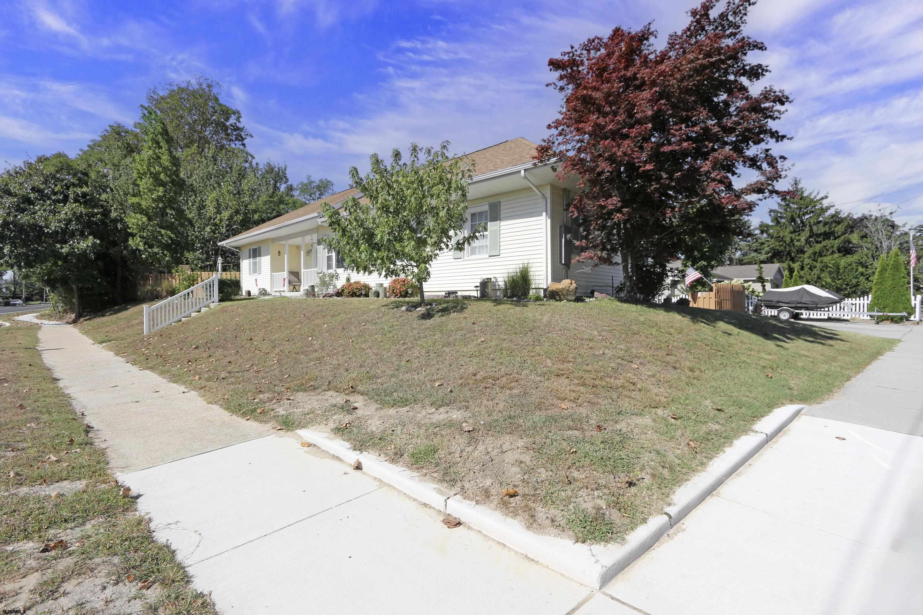 34 North Shore Road Marmora, NJ 08223 - Photo 36 of 37 front view of a house with a yard