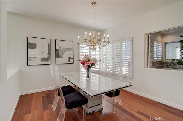 a kitchen with stainless steel appliances granite countertop a sink and a stove