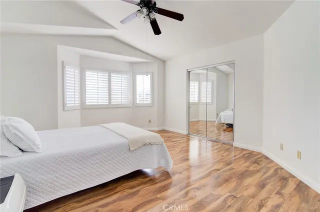 a spacious bathroom with a tub shower and sink