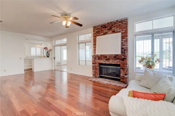 a bedroom with a bed and a fireplace