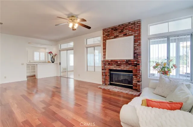 a bedroom with a bed and a fireplace