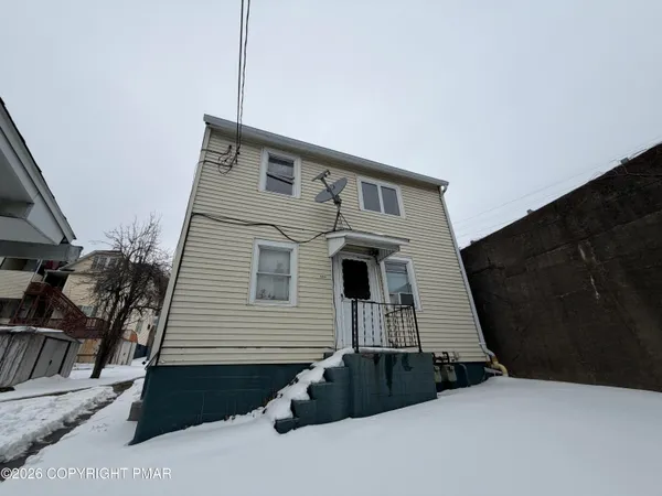 a view of a house with a balcony