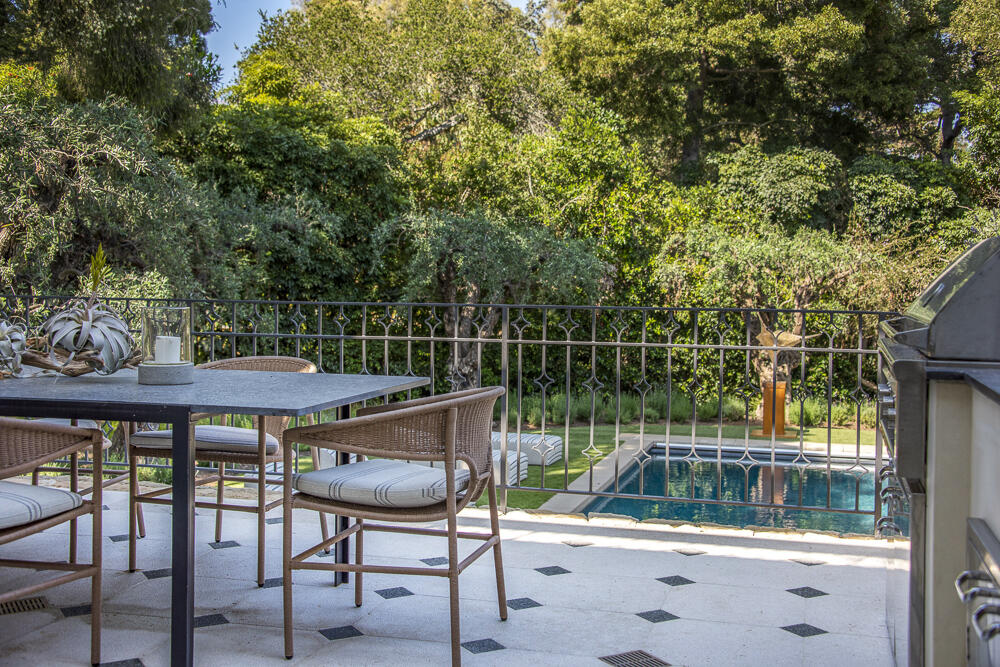 204 Hot Springs Road Santa Barbara, CA 93108 - Photo 16 of 56 a view of a chairs and table in the balcony