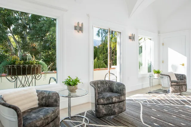 a living room with furniture or window and a fireplace