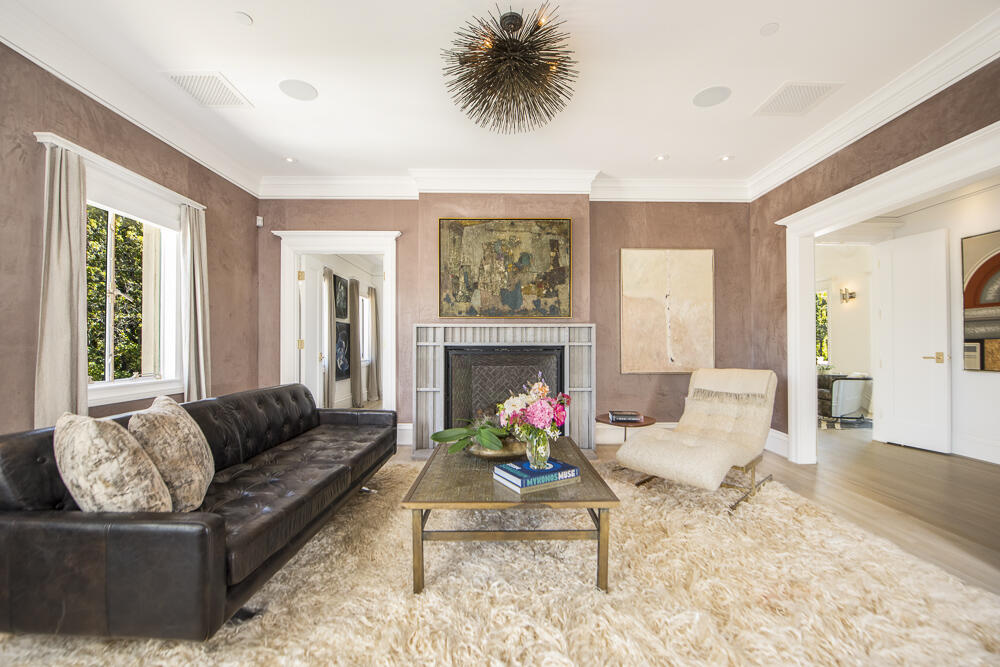 204 Hot Springs Road Santa Barbara, CA 93108 - Photo 22 of 56 a living room with furniture or window and a fireplace