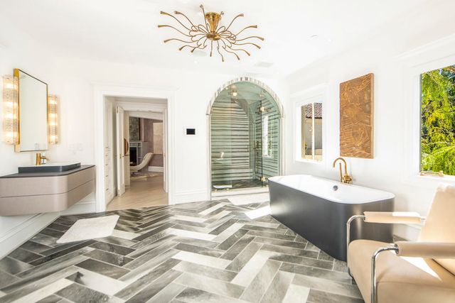 a bedroom with a bed and a couch