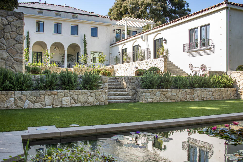 204 Hot Springs Road Santa Barbara, CA 93108 - Photo 3 of 56 a front view of a house with a garden