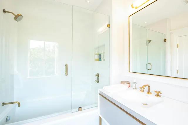 a bathroom with a sink a toilet and a bathtub