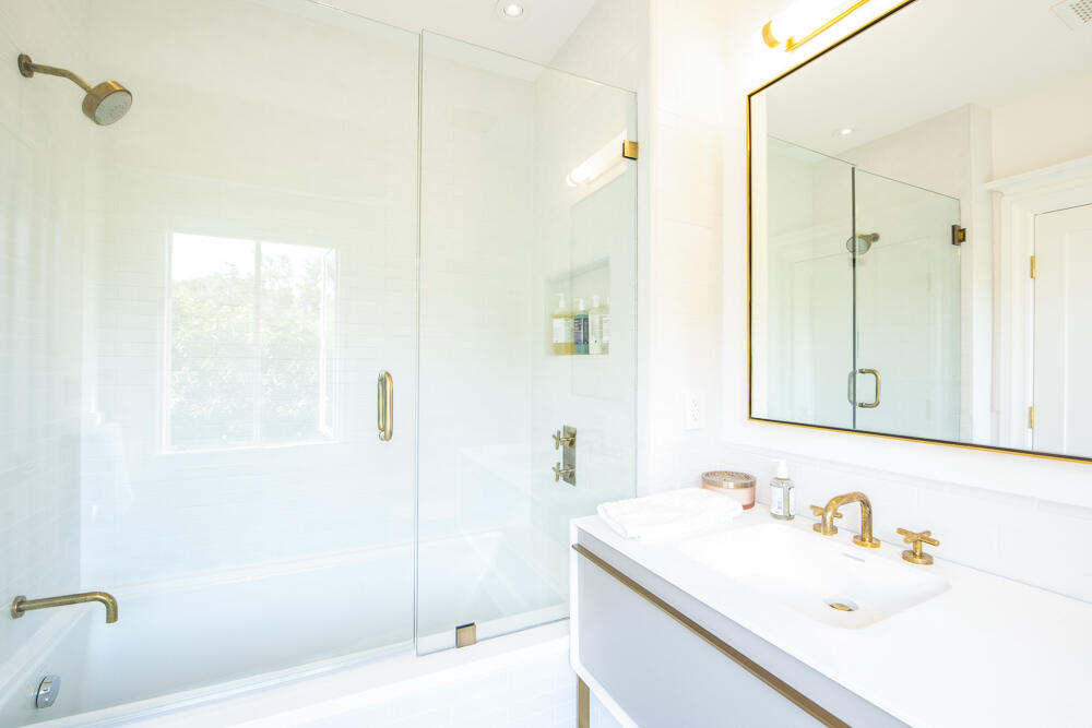 204 Hot Springs Road Santa Barbara, CA 93108 - Photo 32 of 56 a bathroom with a sink a shower and a mirror