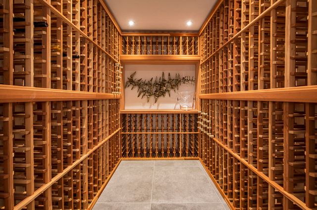 a view of swimming pool with a two chairs in a patio