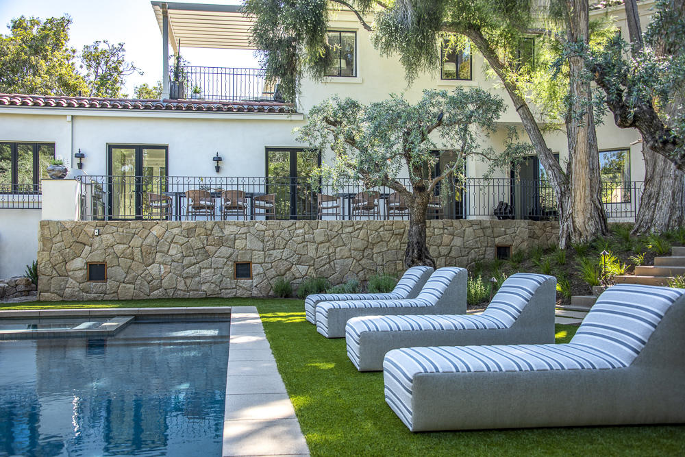 204 Hot Springs Road Santa Barbara, CA 93108 - Photo 42 of 56 a view of a patio with couches and a potted plant on a table