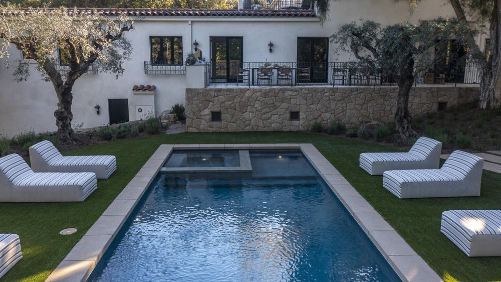 204 Hot Springs Road Santa Barbara, CA 93108 - Photo 45 of 56 a view of a patio with couches chairs and a fire pit