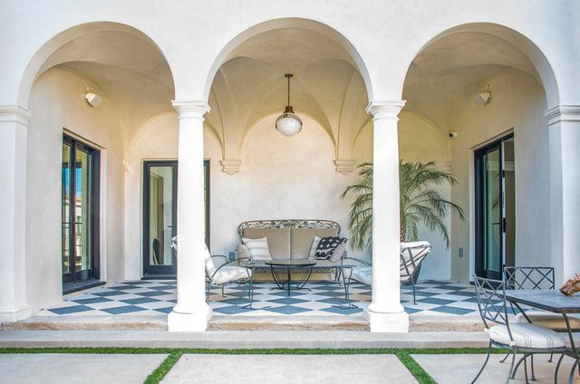 an aerial view of residential house and green space