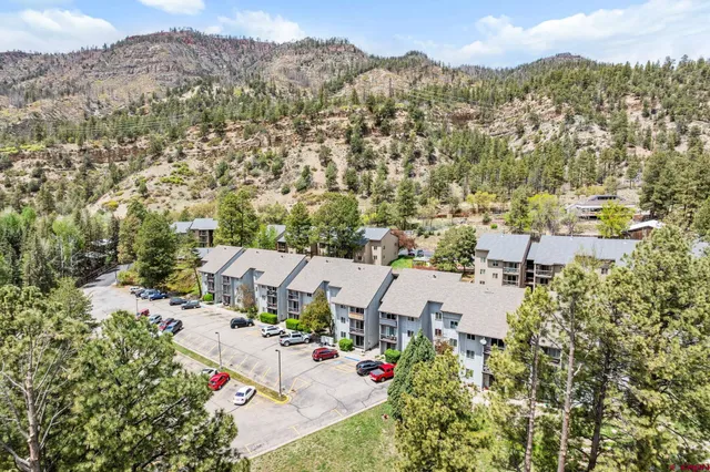 a view of a city with a lake