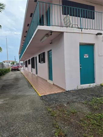 a view of a house with a street