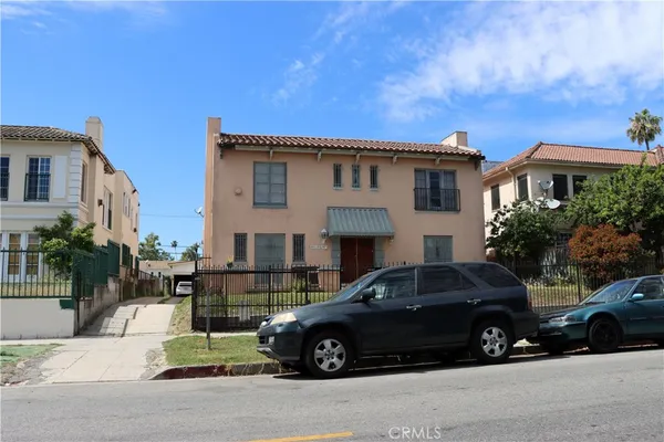a car parked in front of a house