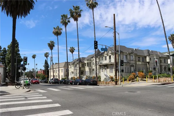 a view of a street with a building on the road
