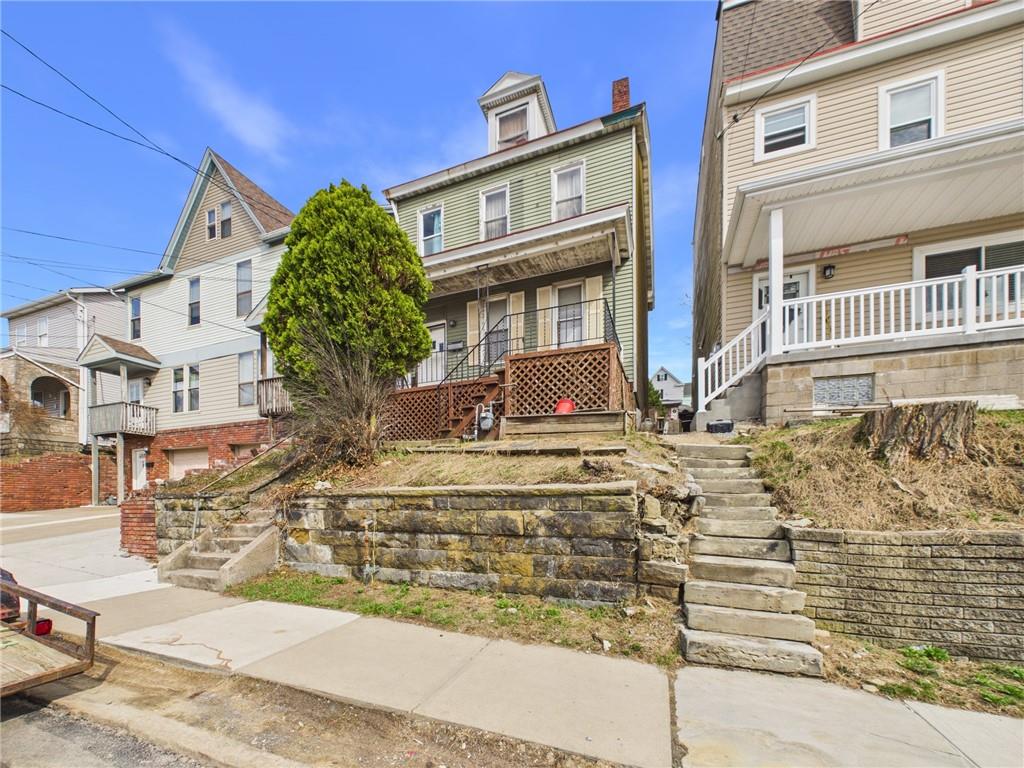 front view of a house with a street