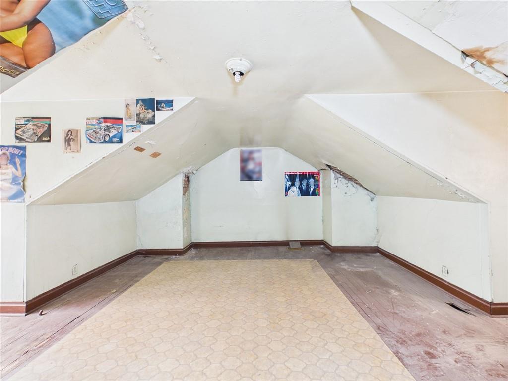 21 Ruth Street Pittsburgh, PA 15211 - Photo 17 of 18 a view of a hallway with a white walls