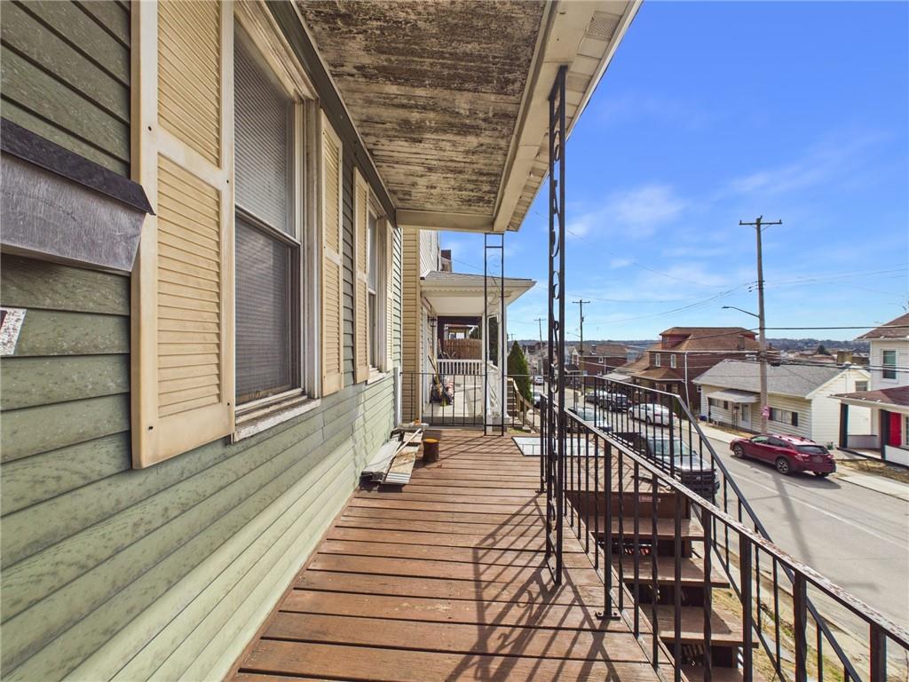 21 Ruth Street Pittsburgh, PA 15211 - Photo 4 of 18 a view of a balcony with chairs