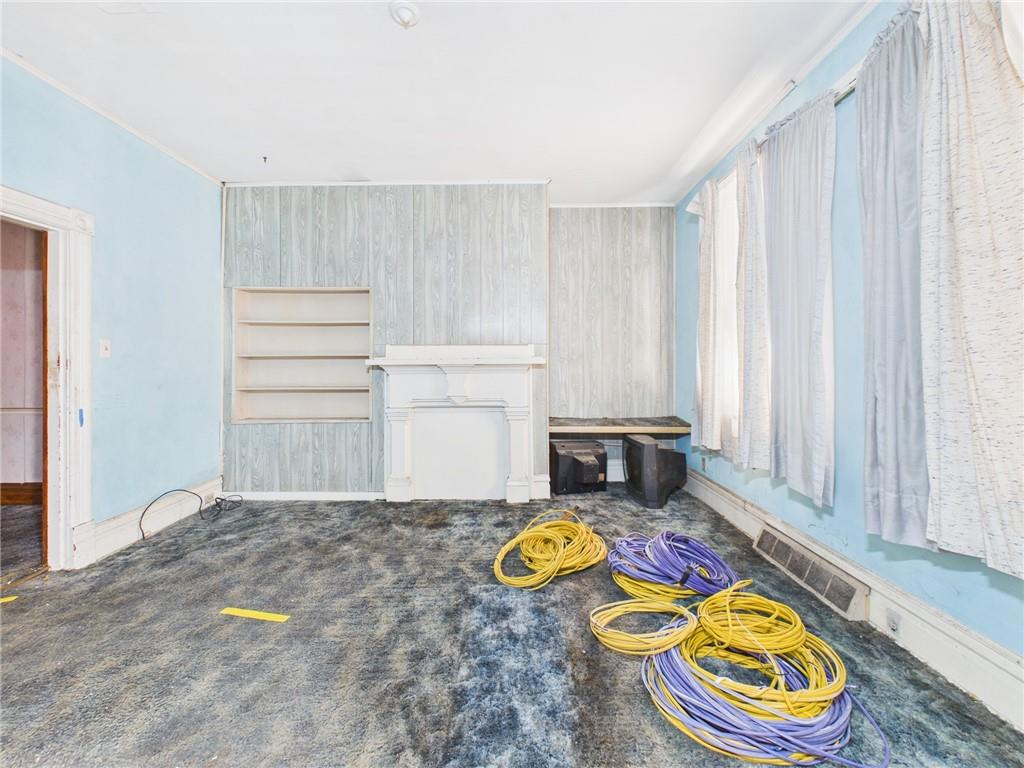 21 Ruth Street Pittsburgh, PA 15211 - Photo 5 of 18 a view of a room with gym equipment