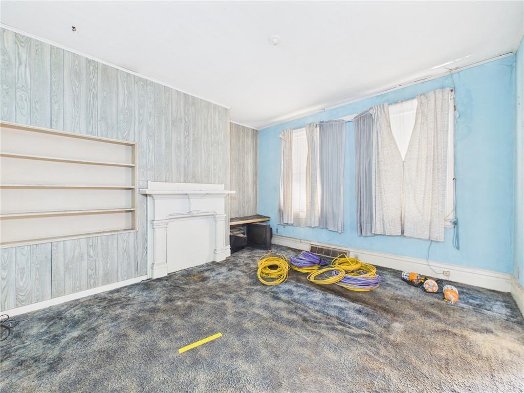 21 Ruth Street Pittsburgh, PA 15211 - Photo 6 of 18 a view of a room with furniture and rug floor