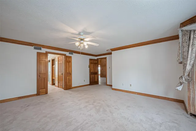 a bath tub sitting in a bathroom next to a sink