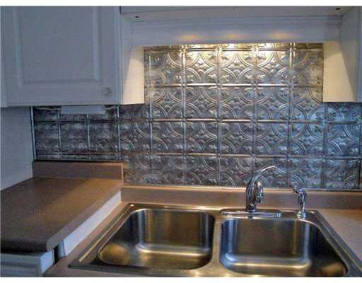 122 Ohio Street Bangor, ME 04401 - Photo 13 of 27 Kitchen. Authentic Tin Backsplash