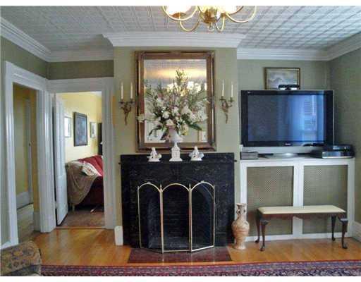 122 Ohio Street Bangor, ME 04401 - Photo 21 of 27 Living Room. Wood Fireplace in...