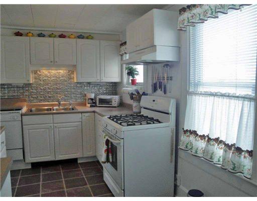 122 Ohio Street Bangor, ME 04401 - Photo 10 of 27 Kitchen. Upstairs Kitchen with Gas Range