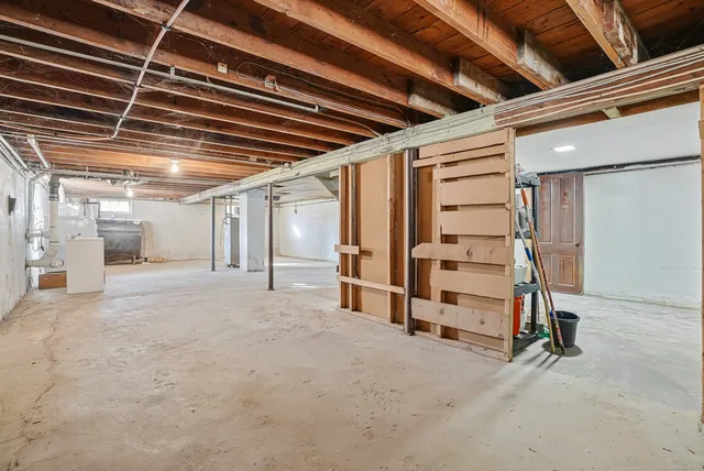 a view of swimming pool with sitting area