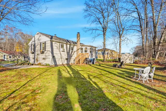 a view of swimming pool with seating area