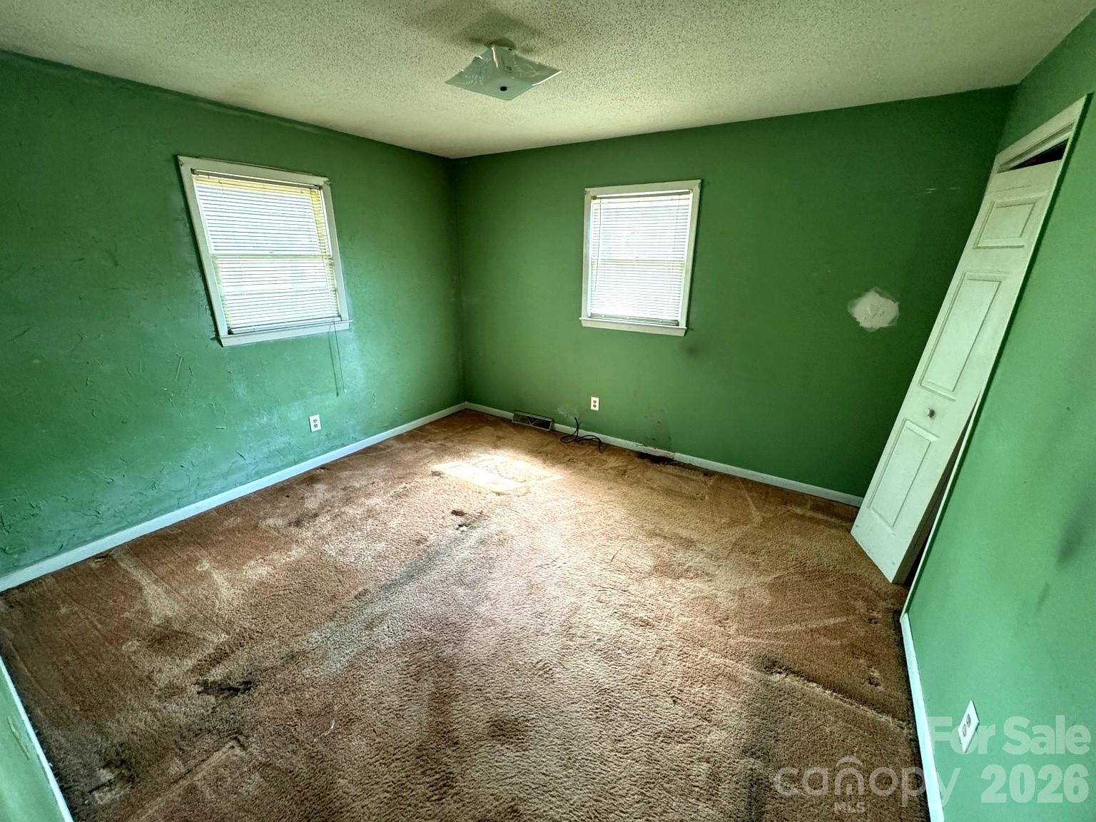 3968 Dover Street Claremont, NC 28610 - Photo 12 of 20 a view of empty room with window