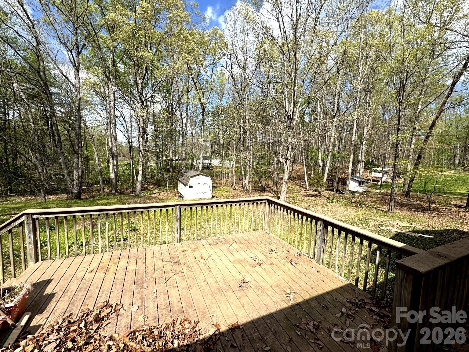 3968 Dover Street Claremont, NC 28610 - Photo 16 of 20 a view of a balcony with wooden floor and fence
