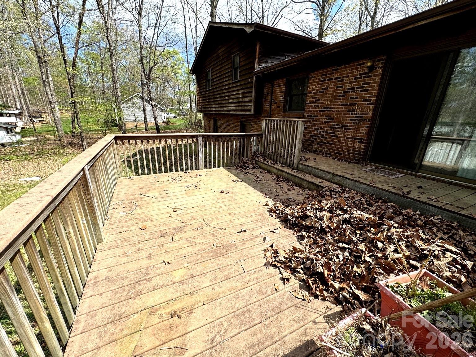 3968 Dover Street Claremont, NC 28610 - Photo 17 of 20 a view of balcony with wooden floor