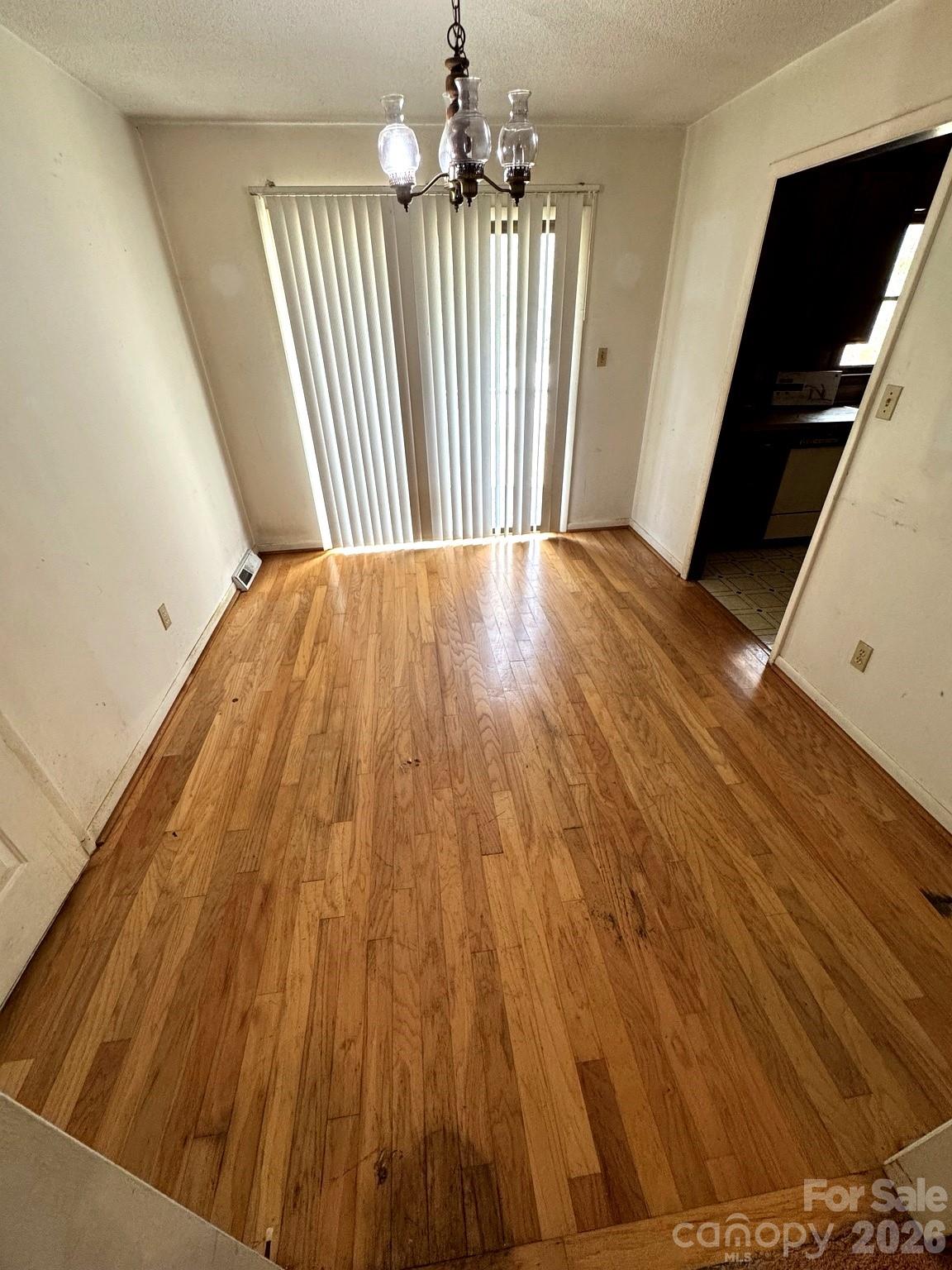 3968 Dover Street Claremont, NC 28610 - Photo 4 of 20 wooden floor in a hall with an entryway