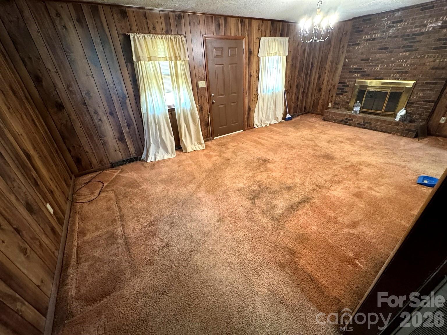 3968 Dover Street Claremont, NC 28610 - Photo 6 of 20 a bedroom with a bed tv and a window