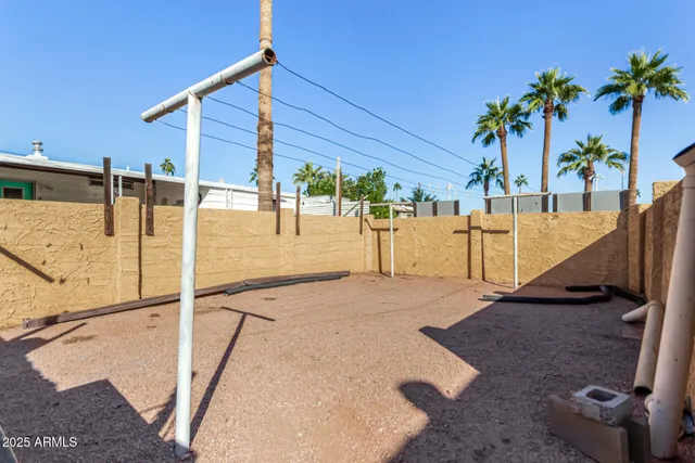 a view of a house with entrance stairs and a porch