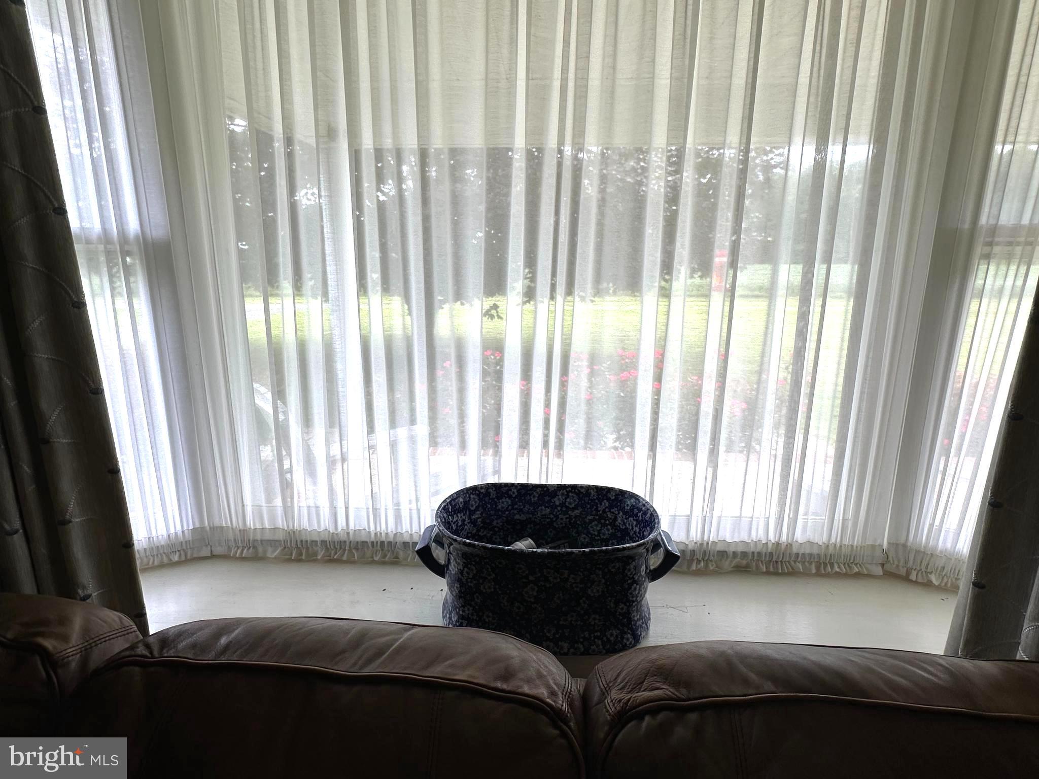 28402 Liden School Road Denton, MD 21629 - Photo 11 of 59 a living room with a couch and furniture