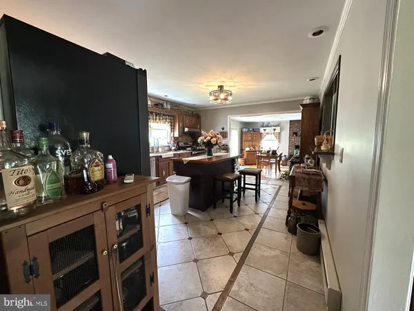 a kitchen with a sink stove top oven and cabinets